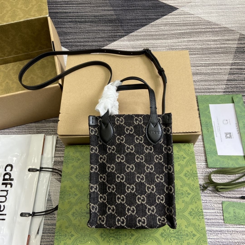 G*u*i top handle bags